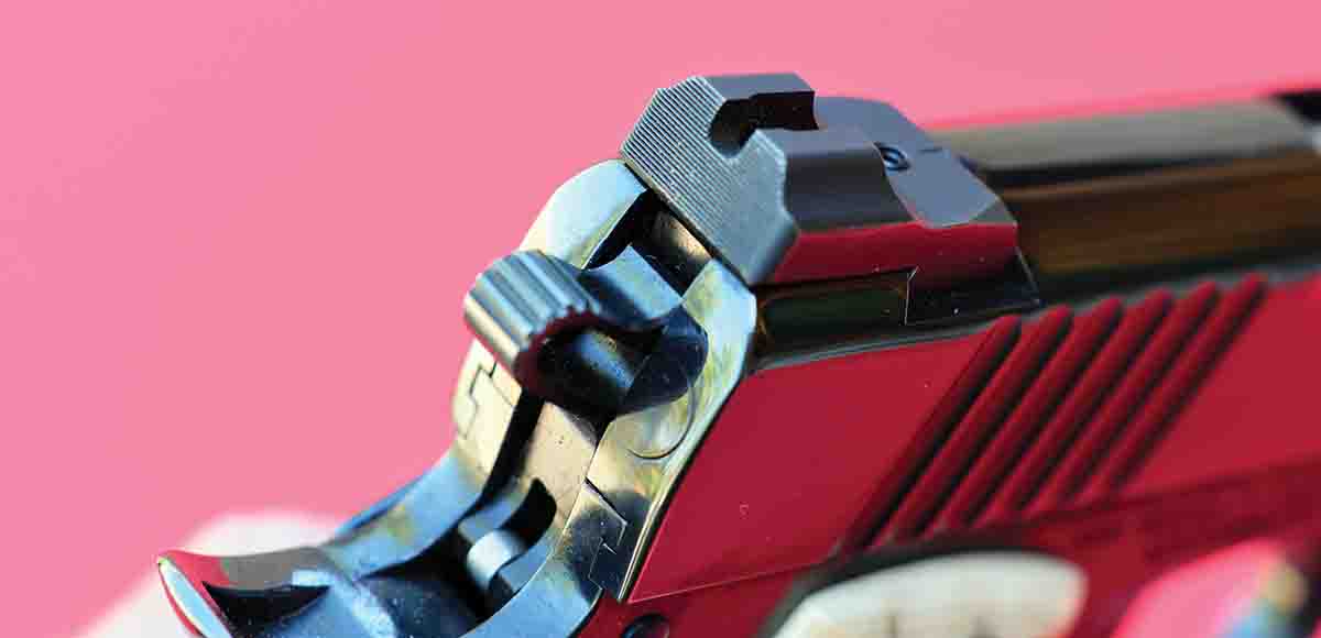 The rear sight is combat-style and is drift adjustable for windage.